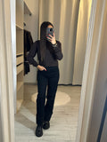 Pull col roulé